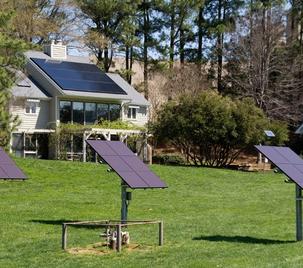 House With Solar Panels in the Yard 