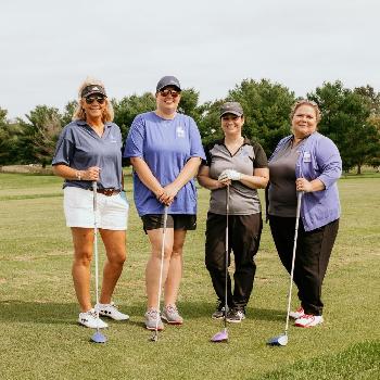 BlueOx employees play gold to support Hit 'em Fore Hospice!