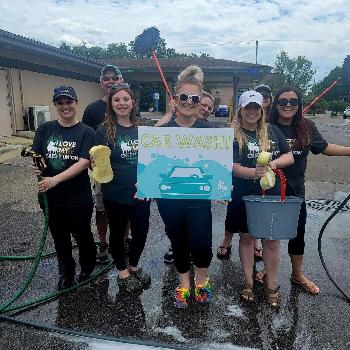 Our Jackson Team washes cars in the area to raise money for Jackson Parks!